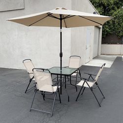 (NEW) $140 Patio 6 Piece Outdoor Set with 32x32” Table, 4pc Folding Chairs and 10 FT Tilt Umbrella 