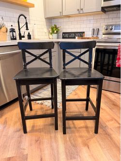 2 wood black counter stools