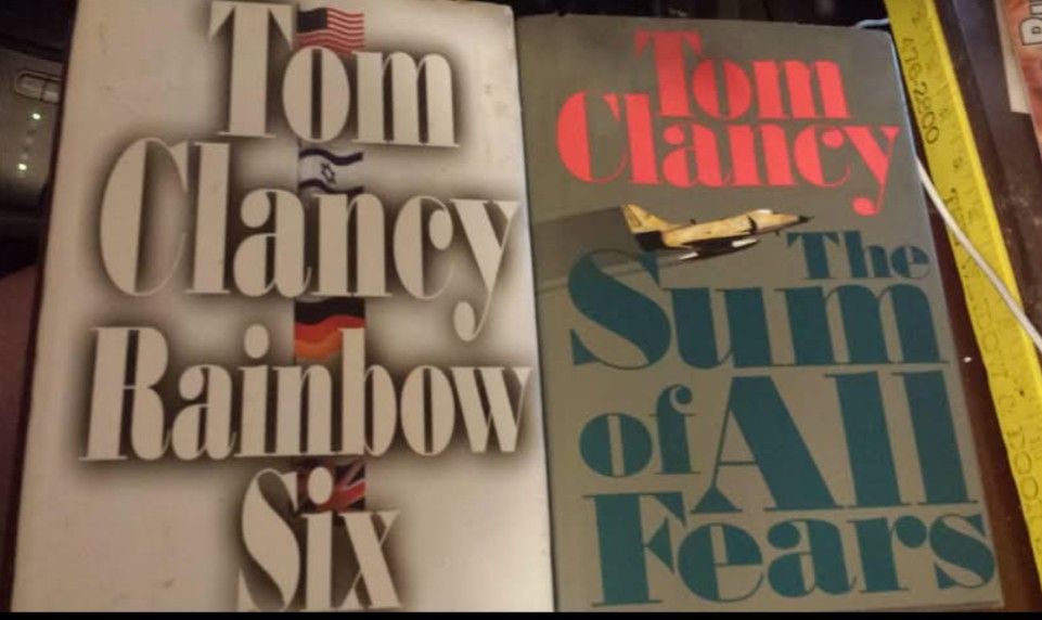 Two Nice Hardcover Books With Jackets By Tom Clancy About 2" Thick. Compare At $30 Ea. Rainbow Six And The Sum Of All Fears.