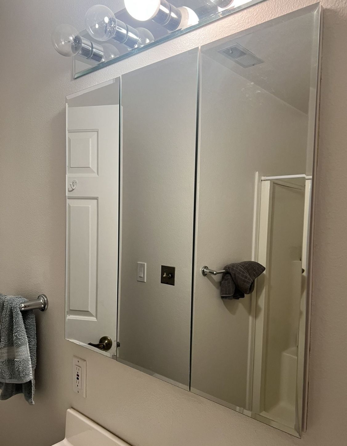 30” Triple Door Mirrored Medicine Cabinet