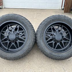 20x10 INCH STEEL OFF-ROAD RIMS WITH 33x12.50R20 TIRES