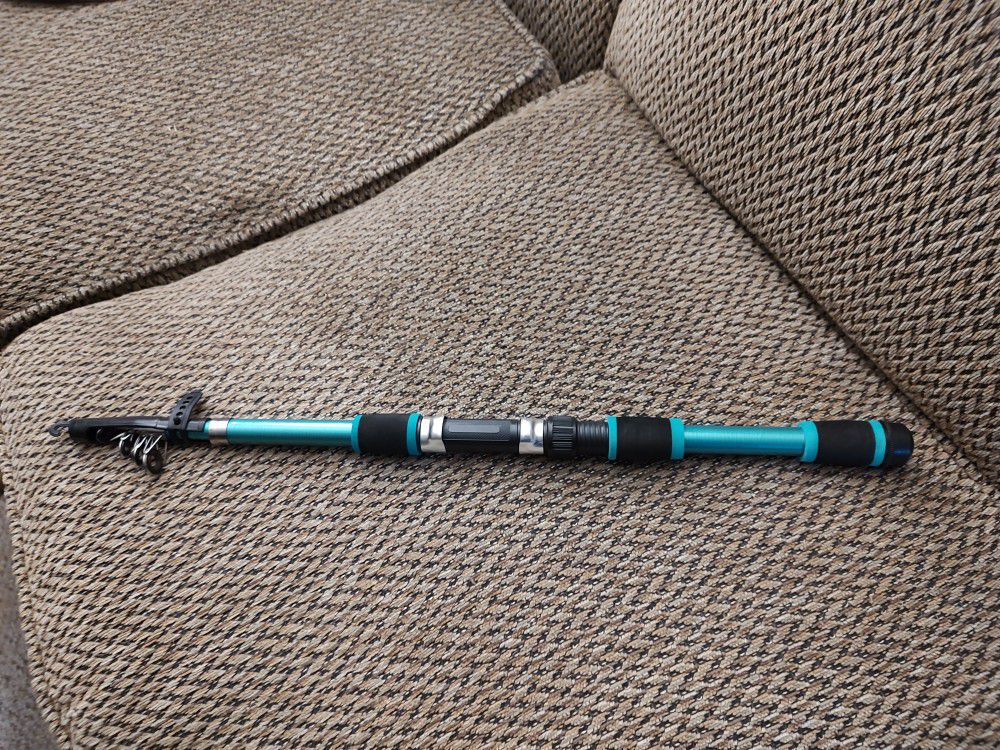 SOUGAYILANG 180 TELESCOPIC TRAVELING  FISHING ROD.  20 IN. EXPANDS TO 6 FT.  ROD ONLY.  NEW. PICKUP ONLY 