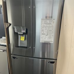 NEW IN BOX LG FRENCH STYLE STAINLESS STEEL REFRIGERATOR 