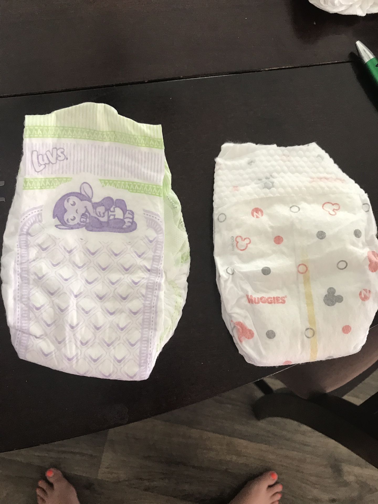 50 newborn diapers (Luvs & Huggies)