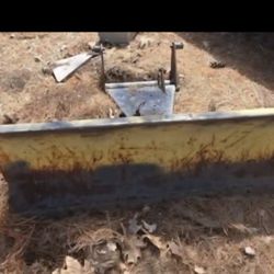 John Deer plow  attaches to lawn tractor 