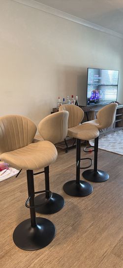 set of 4 adjustable barstools with foot rest