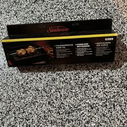 New Sunbeam Cordless Rotisserie $10