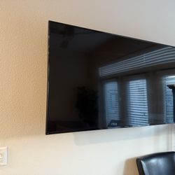 📺 Insignia Flat-Screen TV – Wall Mounted (Great Condition)
