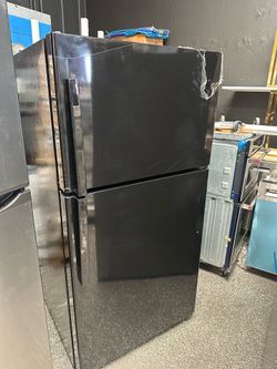 33 inch Black Ge Top freezer refrigerator