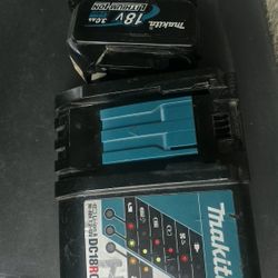  2 batteries and Makita charger
