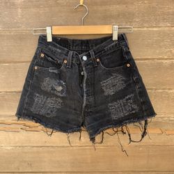 Vintage high waisted black Levi’s 501s Button fly shorts Waisted 12.5 hips 17 inches Rise 11 inches