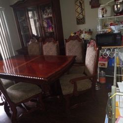 Ashley Terry Wood Dining Set Six Chairs Very Heavy To Lift Too Big For My Apartment Need To Sell $800.The Cabinet Is $800.