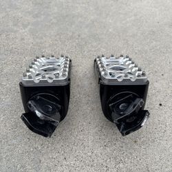 Surron pegs 