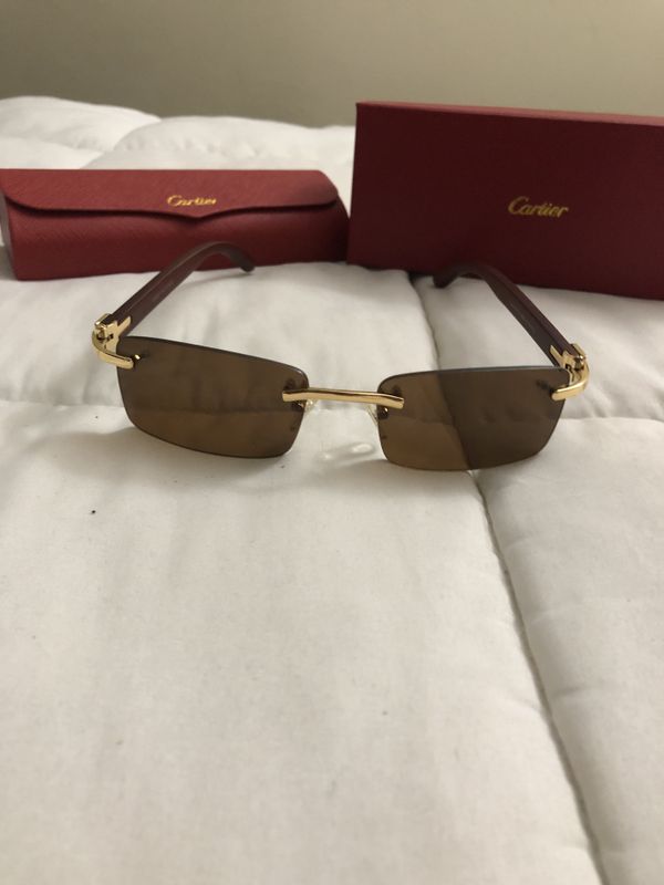 brown cartier glasses