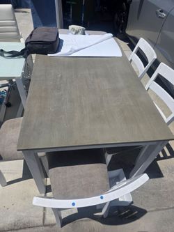 Dining table and 4 chairs $20