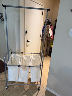 Laundry rod and hampers
