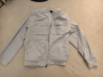 Two jackets and a pair of Levi's jeans