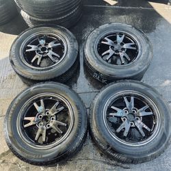 Set Of Four Rims And Tires For Toyota Prius In Black 10 - 15