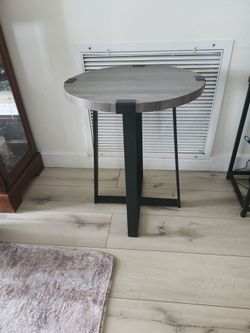 Small grey round table