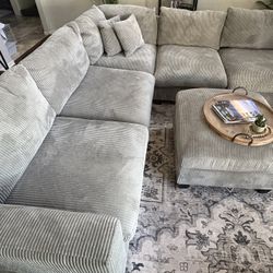 Grey couch w matching ottoman 
