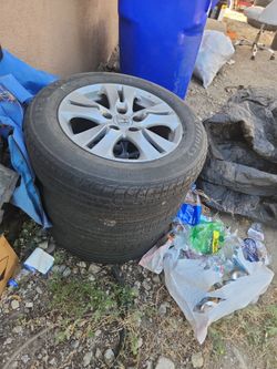 4 honda wheels 1 cracked tires are good