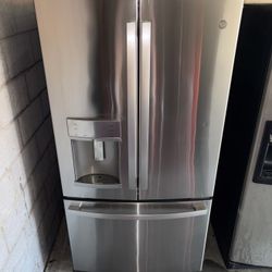 GE Stainless Steel Refrigerator And Freezer