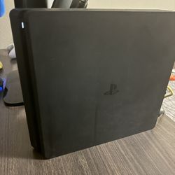 PS4 with 2 controllers and all the cords 