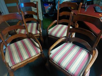Set of 4 Wood Chairs with Cushions. Good Condition. Minor Marks and Wear.