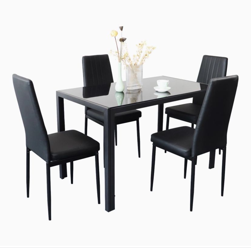 Black Glass Table With 4 Brand New Chairs