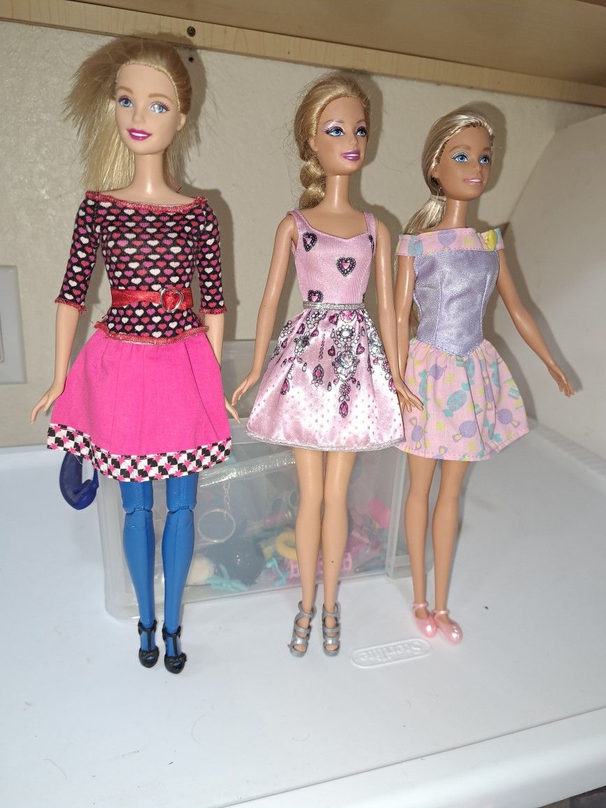       3 Barbies  Good Condition,  Extra Clothing $10.00