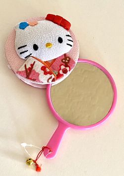 Hello Kitty Vanity Hand Held Mirror w/D Hello Kitty Fabric cover LIMITED EDITION