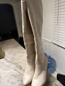 Knee high white boots