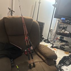 3 Fishing  Rods Good Condition And 