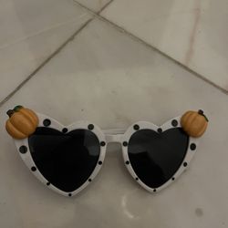 two pairs of Halloween sunglasses