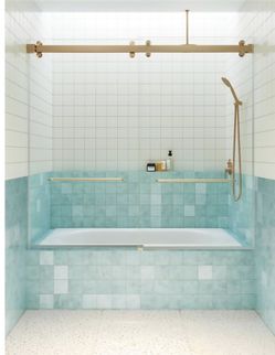 Glass Warehouse
Polaris 60 in. W x 66 in. H Sliding Frameless Bathtub Door with Square Hardware in Brushed Bronze with Clear Glass