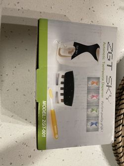 Toothbrush holder (new in box)