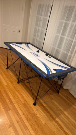 Air hockey table. 72 inches. Electric. Great condition.
