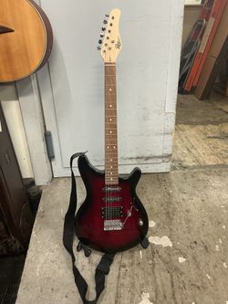 Rogue RR100 Rocketeer Electric Guitar – Wine Burst – Excellent Condition