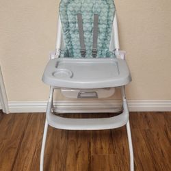 Like New Ingenuity Baby High Chair ( Foldable). Price Firm!