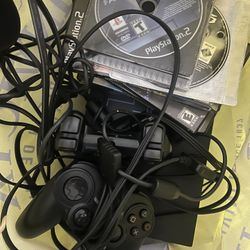 PlayStation 2 Comes With 9 Games And 2 Controllers 