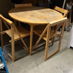 Table and four chairs