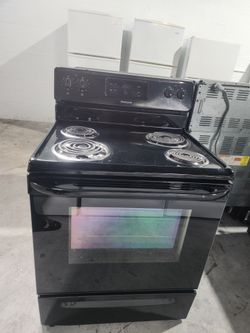 Estufa Frigidaire negra como nueva