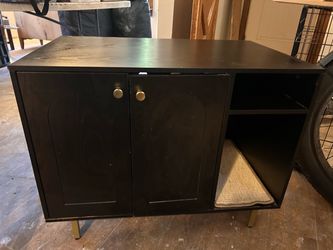 Black Cabinet with Gold Legs and Knobs
