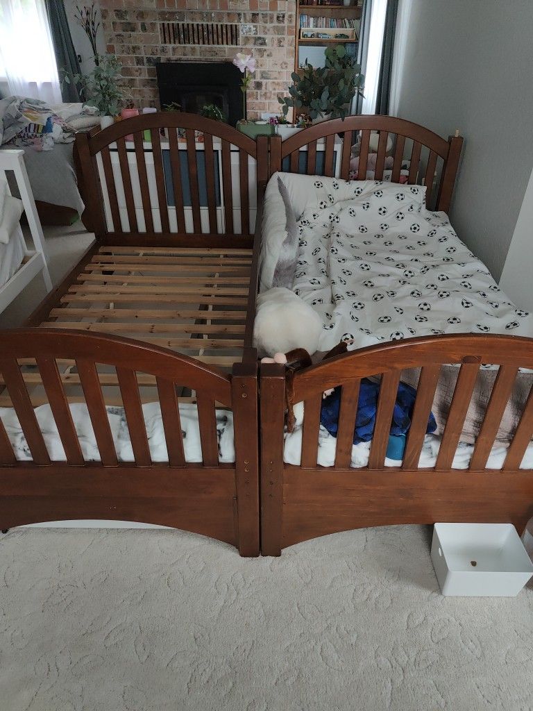 Two Twin Size Bed. Negotiable.