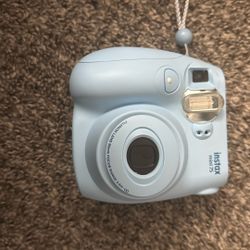 instax mini 75 blue comes with extra picture papers