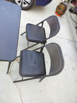 Folding table and two chairs
