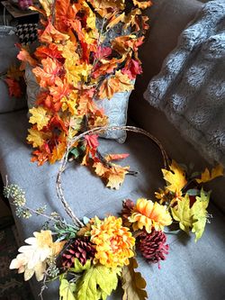 Fall Wreath and 3 Fall Leaf Garlands Set Decorative fall-themed set includes one grapevine wreath with orange flowers, pinecones, and berries, and t