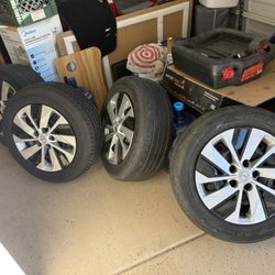 215/60r16 95H  Hankook Kinergy Gt Tires And Rims With Nissan Hubcaps 