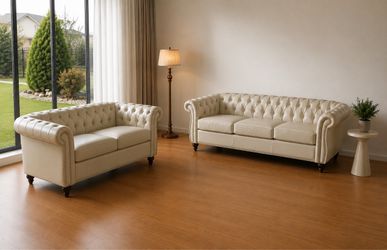 2 cream colored tufted couches