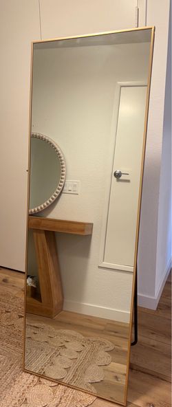 Mirror with built in stand